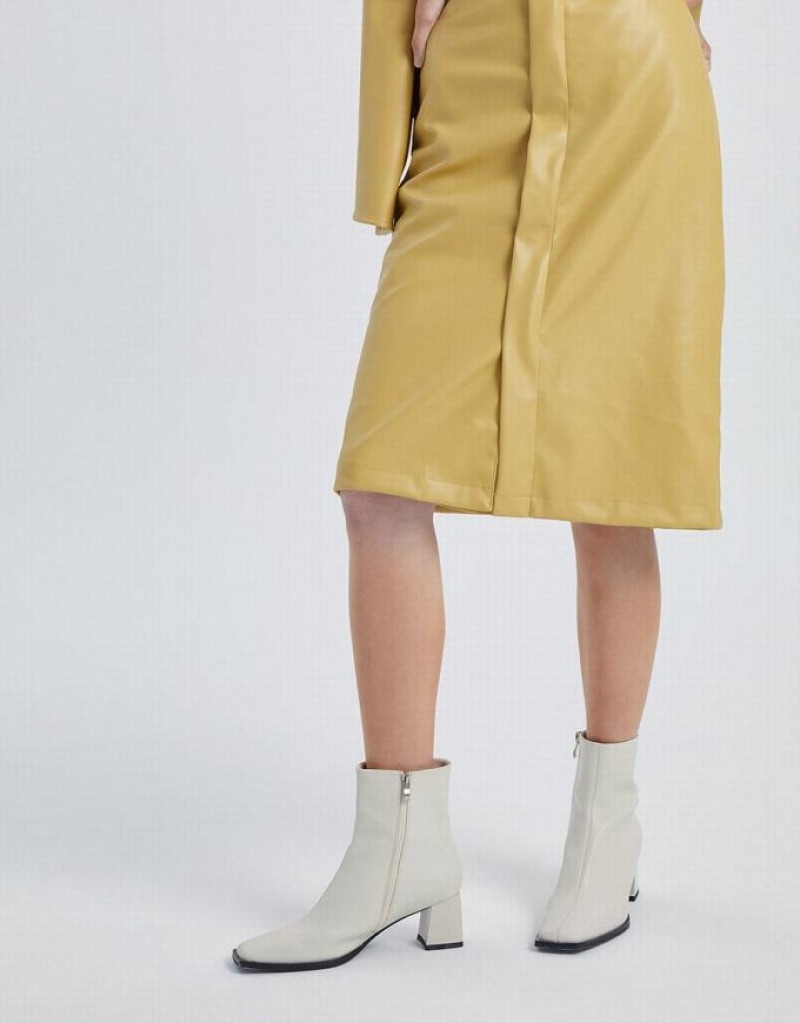 Yellow Urban Revivo Midi Straight Women's Skirts | 93062VBTQ